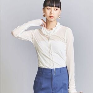 TheOpen Product• Mesh turtleneck pullover